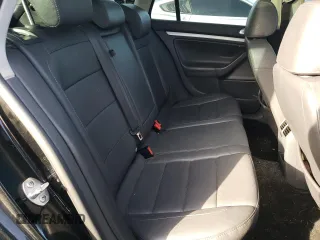 2009 Volkswagen Jetta z VIN 3VWTZ71K99M252459, wystawiony jako Copart lot #77893704 z przebiegiem 181 022 mil mil oraz Szkoda całkowita • Salvage title. Historia ofert i sprzedaży dostępna na DreamBid. Obrazek 11.