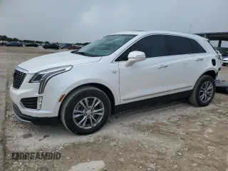 2022 Cadillac XT5 FWD Premium Luxury with VIN 1GYKNCRS0NZ175748, listed as a Copart auction lot 61651885 with 13,747 mi miles and Salvage title. Bid and sale history available at DreamBid. Image 1.