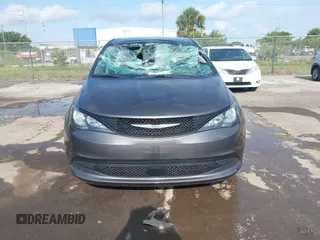 2023 Chrysler Voyager LX z VIN 2C4RC1CG9PR585738, wystawiony jako IAAI lot #42209993 z przebiegiem 50 625 mil mil oraz . Historia ofert i sprzedaży dostępna na DreamBid. Obrazek 12.