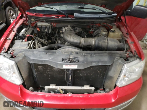 2004 Ford F-150 XLT with VIN 1FTRW14W04KB68404, listed as a Copart auction lot 56980045 with 171,584 mi miles and Salvage title. Bid and sale history available at DreamBid. Image 11.