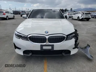 2022 BMW 3 Series 330i with VIN 3MW5R1J08N8C23042, listed as a Copart auction lot 56992485 with 43,693 mi miles and Salvage title. Bid and sale history available at DreamBid. Image 5.