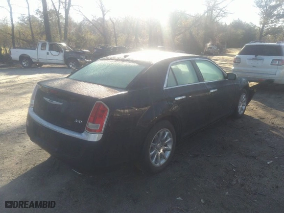 2011 Chrysler 300 Limited with VIN 2C3CA5CG2BH598935, listed as a IAAI auction lot 41719253 with 154,678 mi miles. Bid and sale history available at carsss.com. Image 4.