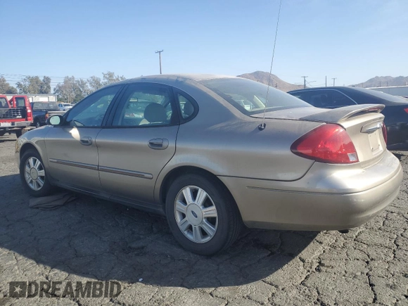 2003 Ford Taurus SEL Deluxe with VIN 1FAFP56S23G221922, listed as a Copart auction lot 79673294 with 142,911 mi miles and Salvage Title. Bid and sale history available at DreamBid. Image 2.
