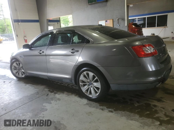 2012 Ford Taurus Limited with VIN 1FAHP2FW3CG113920, listed as a Copart auction lot 55565615 with 131,981 mi miles and Salvage title. Bid and sale history available at DreamBid. Image 2.