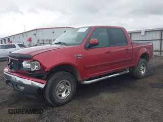 2002 Ford F-150 XLT with VIN 1FTRW08L32KB89593, listed as a IAAI auction lot 41925268 with 178,019 mi miles. Bid and sale history available at carsss.com. Image 2.