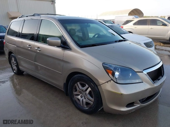 2005 Honda Odyssey EX-L with VIN 5FNRL38735B015831, listed as a IAAI auction lot 41730710 with 295,586 mi miles. Bid and sale history available at carsss.com. Image 1.