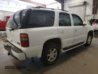 2003 GMC Yukon Denali z VIN 1GKEK63U23J136487, wystawiony jako Copart lot #57974035 z przebiegiem 280 637 mil mil oraz Tytuł czysty. Historia ofert i sprzedaży dostępna na DreamBid. Obrazek 3.
