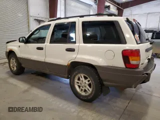 2004 Jeep Grand Cherokee Laredo with VIN 1J4GW48S94C432692, listed as a Copart auction lot 52506585 with 269,983 mi miles and Salvage Title. Bid and sale history available at carsss.com. Image 2.