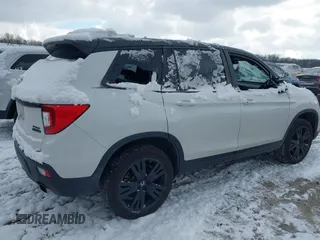 2021 Honda Passport Sport with VIN 5FNYF8H29MB009406, listed as a IAAI auction lot 41246817 with 71,997 mi miles and . Bid and sale history available at DreamBid. Image 4.