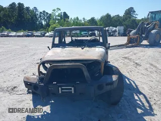 2017 Jeep Wrangler Unlimited Sahara with VIN 1C4HJWEG6HL638014, listed as a IAAI auction lot 39915512 with Not provided miles and . Bid and sale history available at DreamBid. Image 6.