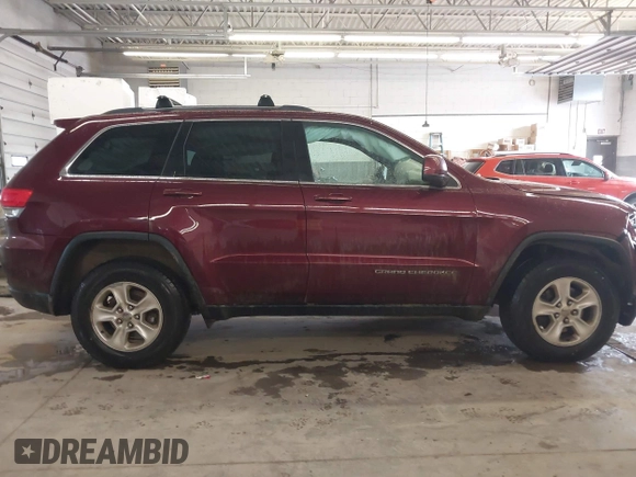 2016 Jeep Grand Cherokee Laredo z VIN 1C4RJFAG3GC471619, wystawiony jako IAAI lot #41659523 z przebiegiem 139 671 mil mil oraz . Historia ofert i sprzedaży dostępna na DreamBid. Obrazek 13.