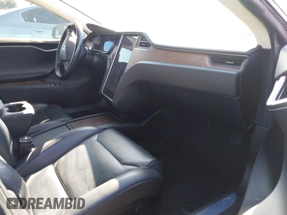 2018 Tesla Model S 75D with VIN 5YJSA1E29JF263418, listed as a IAAI auction lot 41682037 with 84,764 mi miles and . Bid and sale history available at DreamBid. Image 5.