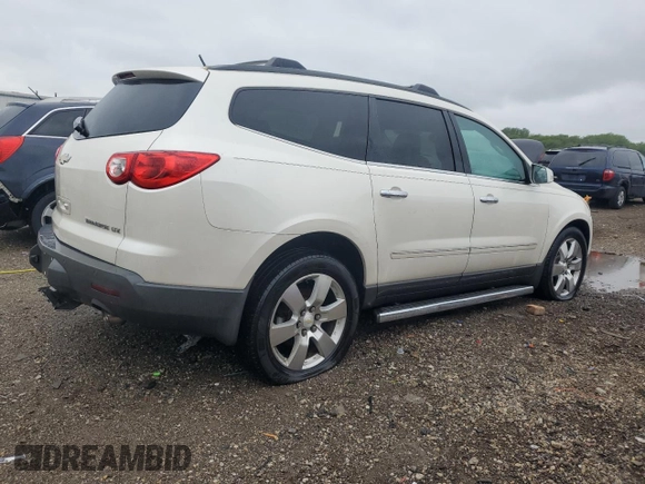 2012 Chevrolet Traverse LTZ z VIN 1GNKVLED5CJ155527, wystawiony jako Copart lot #57597285 z przebiegiem Nie podano mil oraz Szkoda całkowita • Salvage title. Historia ofert i sprzedaży dostępna na DreamBid. Obrazek 3.
