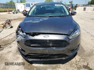2018 Ford Focus SE z VIN 1FADP3F20JL257320, wystawiony jako Copart lot #55956435 z przebiegiem 26 919 mil mil oraz Szkoda całkowita • Salvage title. Historia ofert i sprzedaży dostępna na DreamBid. Obrazek 5.