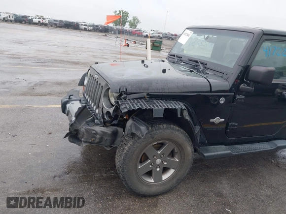 2013 Jeep Wrangler Unlimited Sport z VIN 1C4BJWDGXDL596450, wystawiony jako IAAI lot #42323862 z przebiegiem 114 105 mil mil oraz . Historia ofert i sprzedaży dostępna na DreamBid. Obrazek 18.