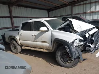 2021 Toyota Tacoma SR z VIN 3TMCZ5AN4MM373247, wystawiony jako IAAI lot #41982617 z przebiegiem 45 692 mil mil oraz . Historia ofert i sprzedaży dostępna na DreamBid. Obrazek 13.