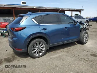 2021 Mazda CX-5 Grand Touring Reserve with VIN JM3KFBAY8M0384498, listed as a Copart auction lot 52013445 with 20,469 mi miles and Salvage Title. Bid and sale history available at carsss.com. Image 3.