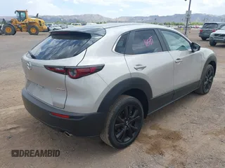 2024 Mazda CX-30 S Select Sport with VIN 3MVDMBBM3RM657918, listed as a IAAI auction lot 42218316 with 27,595 mi miles and . Bid and sale history available at carsss.com. Image 4.