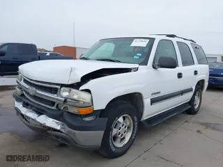 2001 Chevrolet Tahoe LT with VIN 1GNEC13T51R158637, listed as a IAAI auction lot 41718610 with 101,984 mi miles. Bid and sale history available at carsss.com. Image 2.