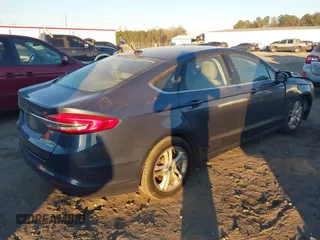 2018 Ford Fusion SE with VIN 3FA6P0HD6JR224085, listed as a IAAI auction lot 41437286 with 85,340 mi miles and . Bid and sale history available at DreamBid. Image 4.