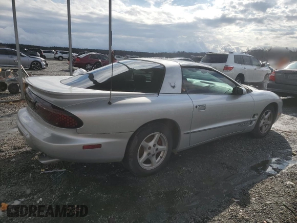 2002 Pontiac Firebird Firebird z VIN 2G2FS22K122146573, wystawiony jako Copart lot #84674224 z przebiegiem 156 932 mil mil oraz Szkoda całkowita • Salvage title. Historia ofert i sprzedaży dostępna na DreamBid. Obrazek 3.