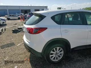 2016 Mazda CX-5 Sport с VIN JM3KE4BY1G0611368, выставлен на аукционе Copart как лот 56979385 с пробегом 106 397 миль миль и Списание • Salvage title. История ставок и продаж доступна на DreamBid. Изображение 14.