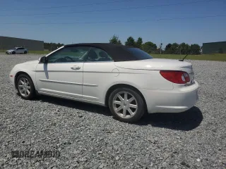 2008 Chrysler Sebring Touring z VIN 1C3LC55R48N181096, wystawiony jako Copart lot #56965745 z przebiegiem 125 873 mil mil oraz Szkoda całkowita • Salvage title. Historia ofert i sprzedaży dostępna na DreamBid. Obrazek 2.