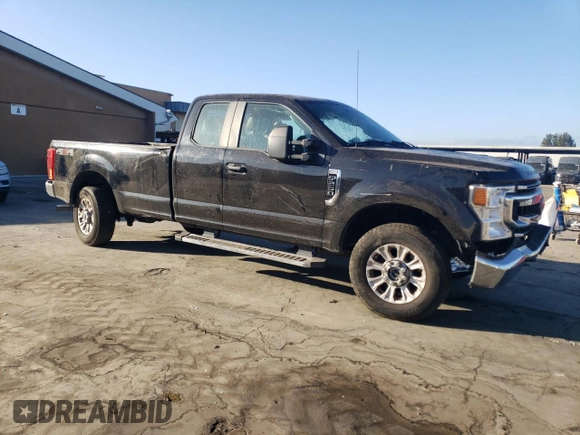 2021 Ford Super Duty F-250 SRW XL with VIN 1FT7X2BN0MEC62141, listed as a Copart auction lot 77142804 with 59,933 mi miles and Salvage Title. Bid and sale history available at carsss.com. Image 4.
