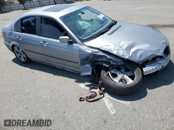 2005 BMW 3 Series 330i with VIN WBAEV53485KM39295, listed as a Copart auction lot 61581235 with 185,054 mi miles and Salvage title. Bid and sale history available at DreamBid. Image 4.