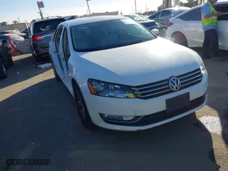 2015 Volkswagen Passat 1.8T S with VIN 1VWAT7A31FC088381, listed as a IAAI auction lot 41366614 with 108,513 mi miles. Bid and sale history available at carsss.com. Image 1.