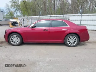 2012 Chrysler 300 C with VIN 2C3CCAKTXCH220185, listed as a IAAI auction lot 42110327 with 57,682 mi miles and . Bid and sale history available at DreamBid. Image 14.