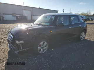 2016 MINI Hardtop 4 Door with VIN WMWXU1C50G2D09465, listed as a Copart auction lot 54975005 with 62,715 mi miles and Salvage Title. Bid and sale history available at DreamBid. Image 1.