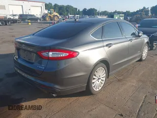 2016 Ford Fusion SE Hybrid с VIN 3FA6P0LU9GR285513, выставлен на аукционе IAAI как лот 42796945 с пробегом 150 697 миль миль и . История ставок и продаж доступна на DreamBid. Изображение 4.