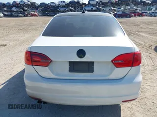 2013 Volkswagen Jetta TDI w/Premium with VIN 3VWLL7AJXDM392313, listed as a IAAI auction lot 42131758 with 98,618 mi miles and . Bid and sale history available at DreamBid. Image 16.