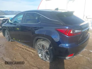 2022 Lexus RX 350 with VIN 2T2HZMDA9NC344583, listed as a IAAI auction lot 41878741 with 27,946 mi miles and . Bid and sale history available at DreamBid. Image 3.