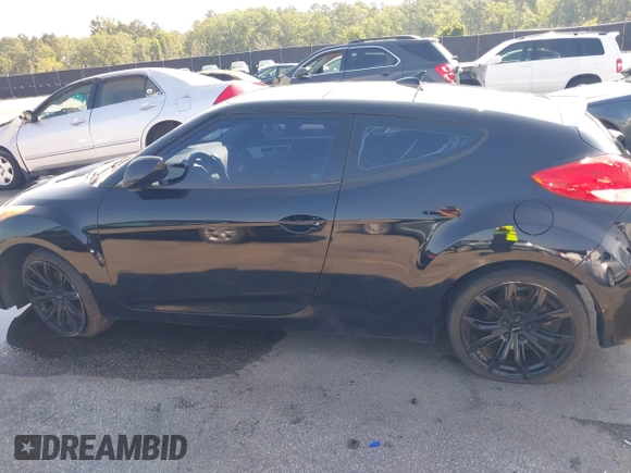 2012 Hyundai Veloster w/Black Int z VIN KMHTC6AD4CU078413, wystawiony jako IAAI lot #42611032 z przebiegiem 142 295 mil mil oraz . Historia ofert i sprzedaży dostępna na DreamBid. Obrazek 14.