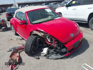 2015 Volkswagen Beetle 1.8T w/Tech with VIN 3VW517AT4FM803238, listed as a IAAI auction lot 41812373 with 42,369 mi miles and . Bid and sale history available at DreamBid. Image 1.