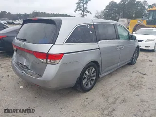 2016 Honda Odyssey Touring Elite with VIN 5FNRL5H90GB097310, listed as a IAAI auction lot 41545601 with 160,198 mi miles. Bid and sale history available at carsss.com. Image 4.