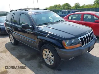 2001 Jeep Grand Cherokee Laredo z VIN 1J4GW48S31C558946, wystawiony jako IAAI lot #42384392 z przebiegiem 252 393 mil mil oraz . Historia ofert i sprzedaży dostępna na DreamBid. Obrazek 1.