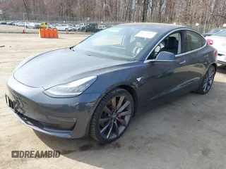 2018 Tesla Model 3 Long Range Battery with VIN 5YJ3E1EB5JF063077, listed as a IAAI auction lot 41773551 with 99,477 mi miles and . Bid and sale history available at DreamBid. Image 17.