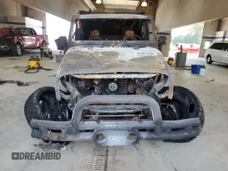 2007 Jeep Wrangler Unlimited X с VIN 1J4GA39167L122826, выставлен на аукционе Copart как лот 62451555 с пробегом Не указан миль и Списание • Salvage title. История ставок и продаж доступна на DreamBid. Изображение 5.
