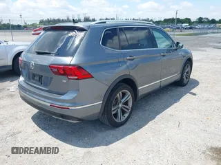2018 Volkswagen Tiguan SEL with VIN 3VV3B7AX9JM178291, listed as a IAAI auction lot 42033485 with 65,641 mi miles and . Bid and sale history available at DreamBid. Image 4.