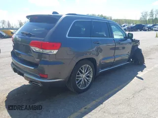 2017 Jeep Grand Cherokee Summit with VIN 1C4RJFJT9HC759417, listed as a IAAI auction lot 42199460 with 129,113 mi miles and . Bid and sale history available at DreamBid. Image 4.