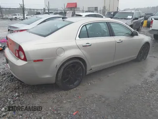 2012 Chevrolet Malibu LTZ with VIN 1G1ZG5E77CF280287, listed as a IAAI auction lot 41299186 with 146,899 mi miles and . Bid and sale history available at DreamBid. Image 4.