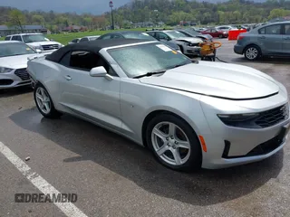 2019 Chevrolet Camaro 1LT z VIN 1G1FB3DS7K0144352, wystawiony jako IAAI lot #41999119 z przebiegiem 125 471 mil mil oraz . Historia ofert i sprzedaży dostępna na DreamBid. Obrazek 1.