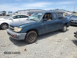 1998 Toyota Tacoma with VIN 4TAVL52N8WZ093787, listed as a Copart auction lot 65598315 with 406,610 mi miles and Salvage title. Bid and sale history available at DreamBid. Image 1.