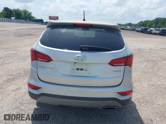 2018 Hyundai Santa Fe 2.4L with VIN 5XYZT3LB4JG557373, listed as a IAAI auction lot 42511741 with 142,572 mi miles and . Bid and sale history available at DreamBid. Image 17.