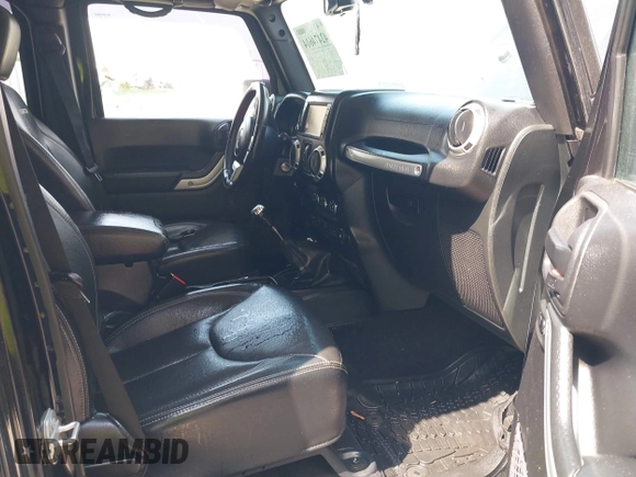 2015 Jeep Wrangler Unlimited Rubicon Hard Rock с VIN 1C4HJWFG0FL550247, выставлен на аукционе IAAI как лот 42474614 с пробегом 93 084 миль миль и . История ставок и продаж доступна на DreamBid. Изображение 5.