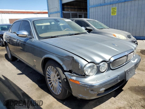 2006 Jaguar XJ Vanden Plas with VIN SAJWA82BX6SH09069, listed as a Copart auction lot 68122604 with 153,999 mi miles and Salvage Title. Bid and sale history available at carsss.com. Image 4.