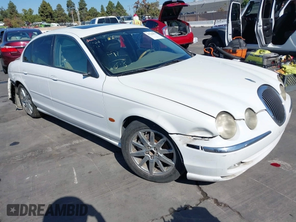 2000 Jaguar S-Type V8 with VIN SAJDA01D9YGL52238, listed as a IAAI auction lot 38743231 with Not Provided miles and . Bid and sale history available at DreamBid. Image 1.